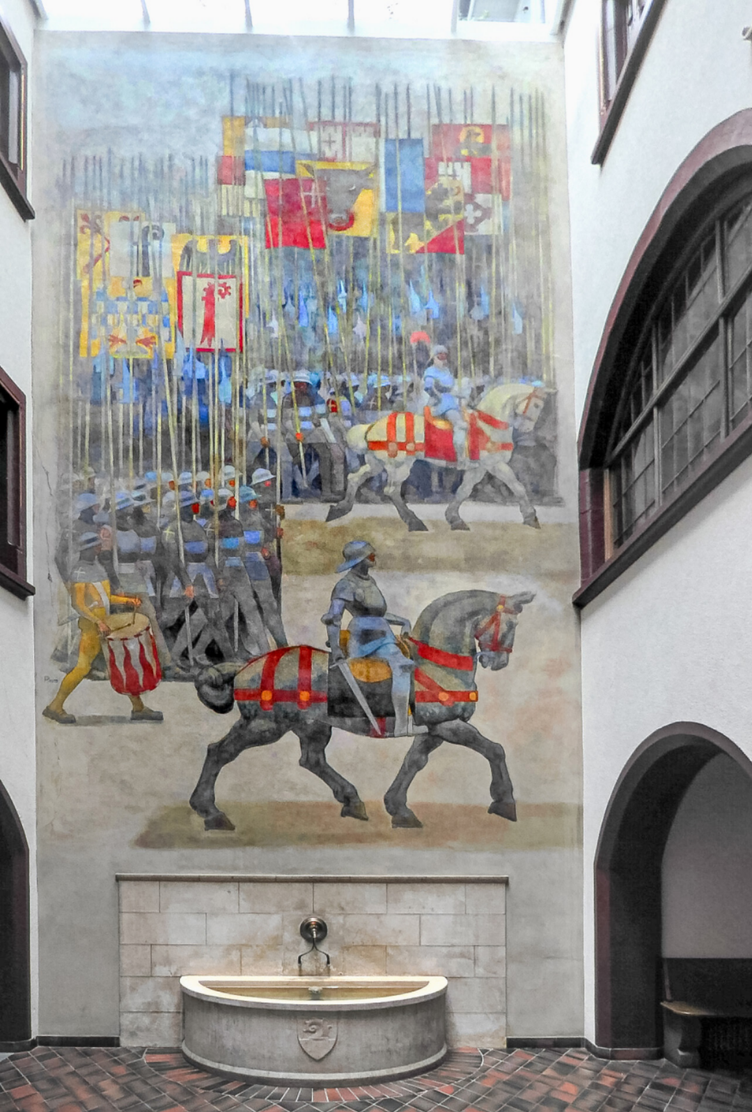 Das Wandbild im Innenhof des Liestaler Rathauses zeigt den Auszug der Baselbieter und Eidgenossen in die Schlacht von St. Jakob (1939). Bild zvg / Wikimedia Das Wandbild im Innenhof des Liestaler Rathauses zeigt den Auszug der Baselbieter und Eidgenossen in die Schlacht von St. Jakob (1939). Bild zvg / Wikimedia